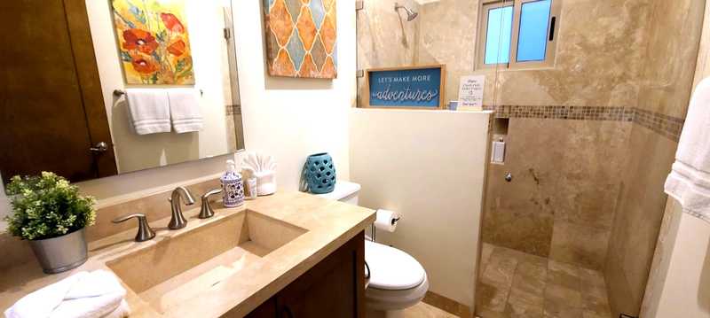 Guest bathroom with walk-in shower at Casa de Corona vacation rental in Cabo San Lucas