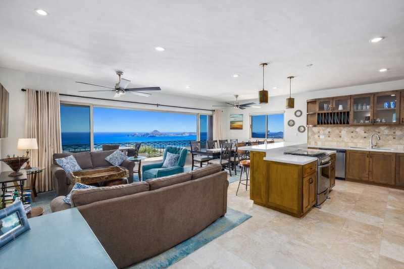 Living room with panoramic ocean views at Casa de Corona, a Cabo San Lucas vacation rental