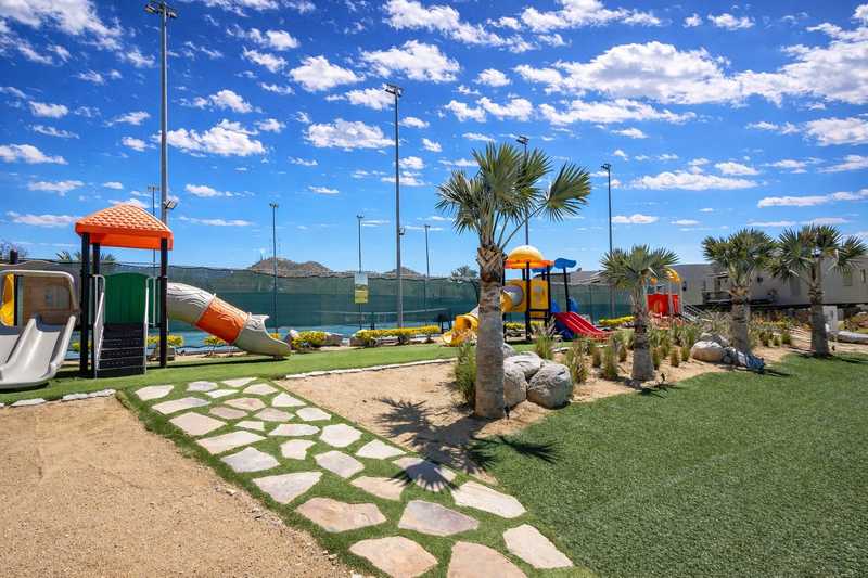 Children's playground and tennis courts at El Tezal vacation rental in Cabo San Lucas